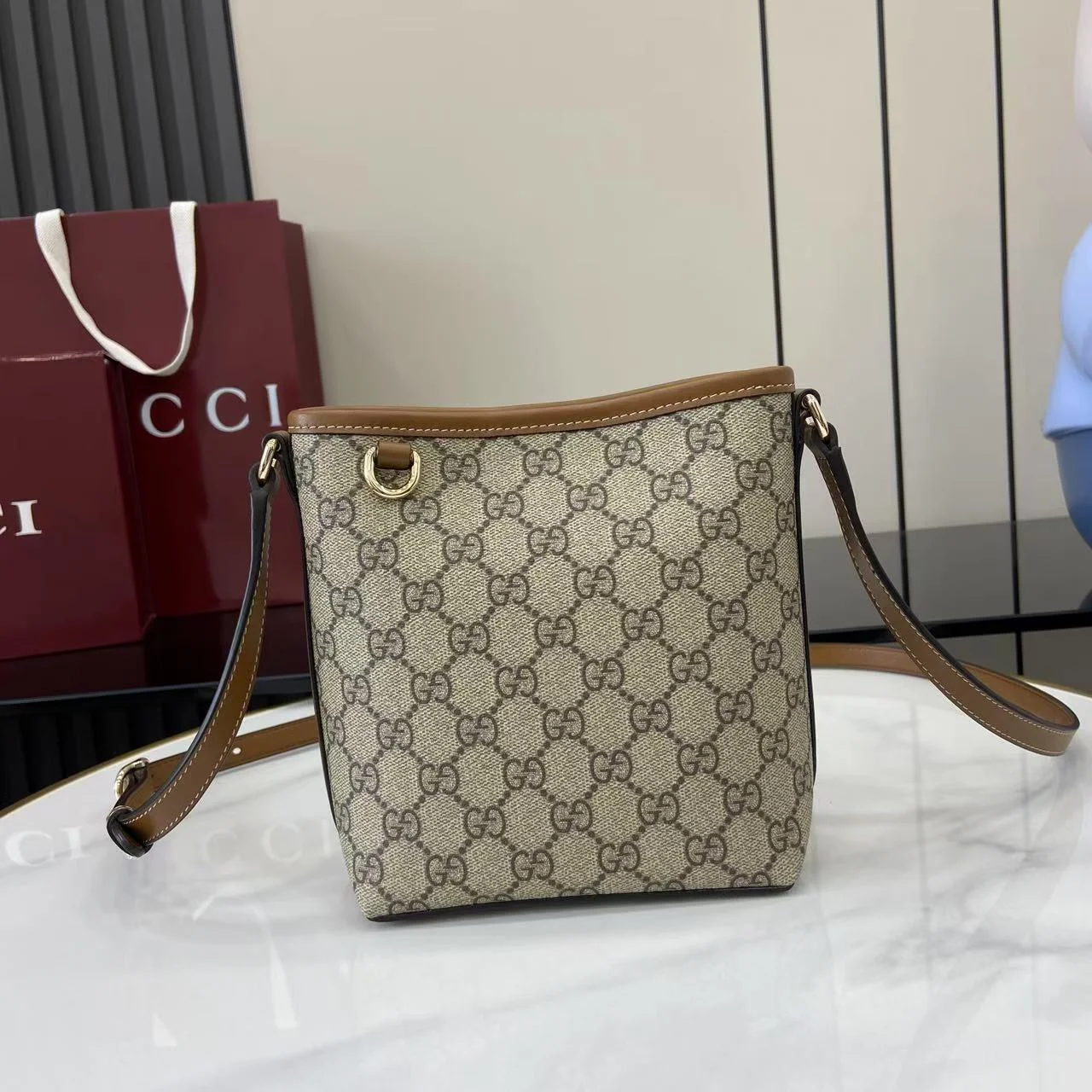 1-1888 UbestLuxury Gucci GG Emblem Mini Bucket Bag main product photo SKU GU25677