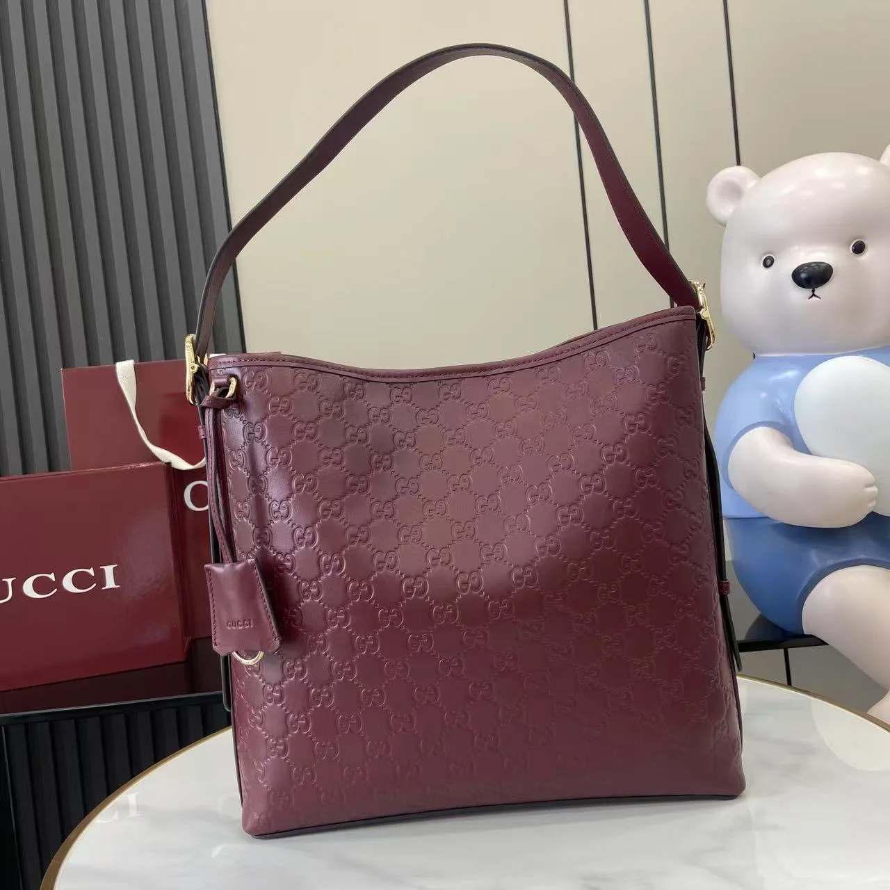 1-1902 UbestLuxury Gucci GG Emblem Bucket Bag main product photo SKU GU25686