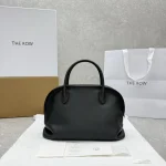 The Row Agnes Bowling Bag in Black or Dark Brown