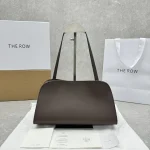 The Row Peggy Clutch Handbag