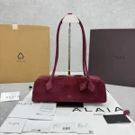 Alaia Le Teckel Suede Wine Red Sausage Bag