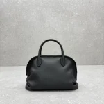 The Row Agnes Bowling Bag in Black or Dark Brown - Image 3