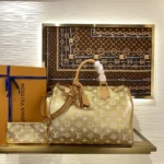 Louis Vuitton Speedy P9 Bandouliere 40 Gold