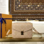 Louis Vuitton Pochette Metis MM Empreinte Couture M29497