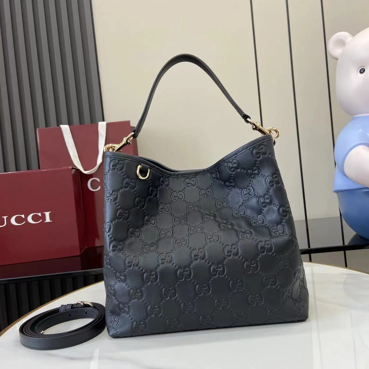 1-1653 Gucci GG Emblem Bucket Bag 815103 - Image 1
